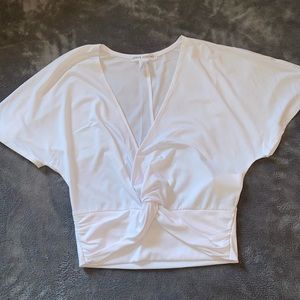 White crop top with a tie in the front🤍